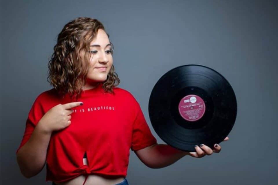 Young woman, vinyl record