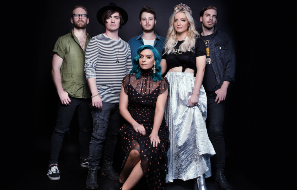 posing, black background