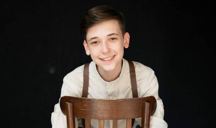 smiling, wooden chair