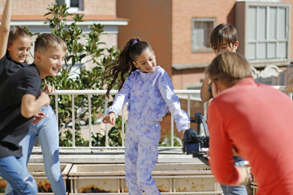 group, playing, camera