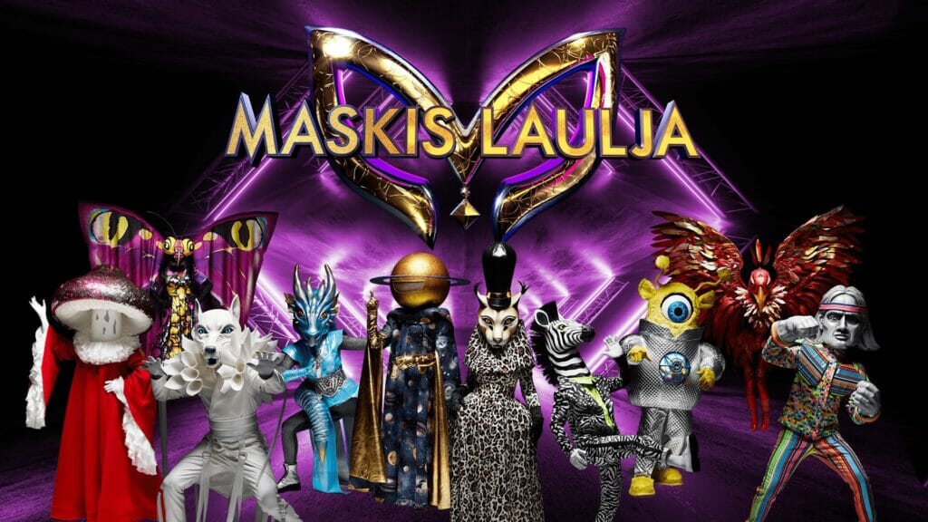 A group of people in costumes with masks.